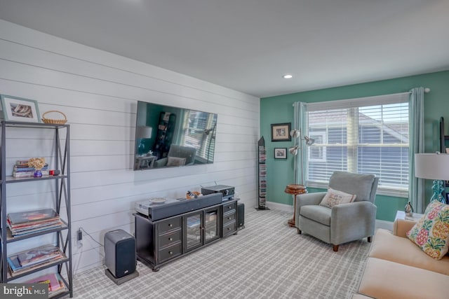 20785 Rodney Dr, Rehoboth Beach, DE 19971 - living area with wooden walls, carpet floors, recessed lighting, and baseboards
