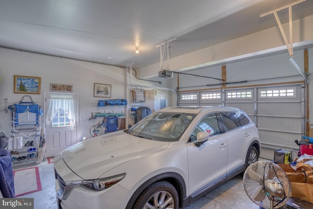 20785 Rodney Dr, Rehoboth Beach, DE 19971 - garage featuring a garage door opener