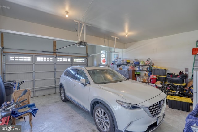 20785 Rodney Dr, Rehoboth Beach, DE 19971 - garage featuring a garage door opener