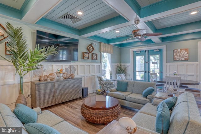 20785 Rodney Dr, Rehoboth Beach, DE 19971 - living area with coffered ceiling, a decorative wall, beamed ceiling, french doors, and wood finished floors