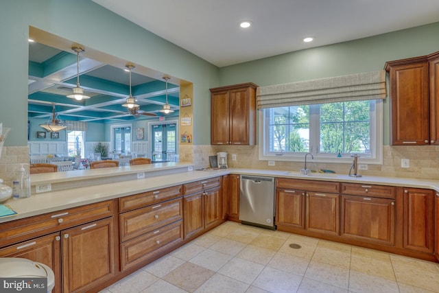 20785 Rodney Dr, Rehoboth Beach, DE 19971 - kitchen featuring dishwasher, brown cabinetry, a sink, decorative backsplash, and recessed lighting