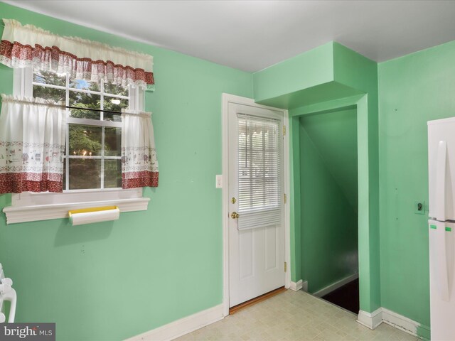 1808 Cody Dr, Silver Spring, MD 20902 - doorway to outside featuring baseboards