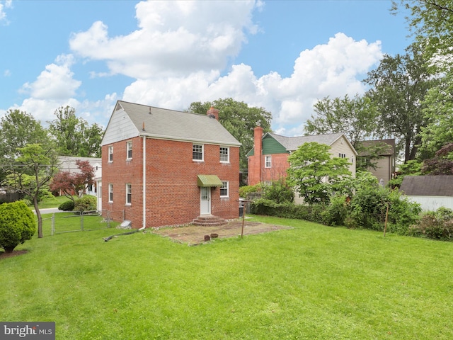 1808 Cody Dr, Silver Spring, MD 20902 - back of property with brick siding and a chimney