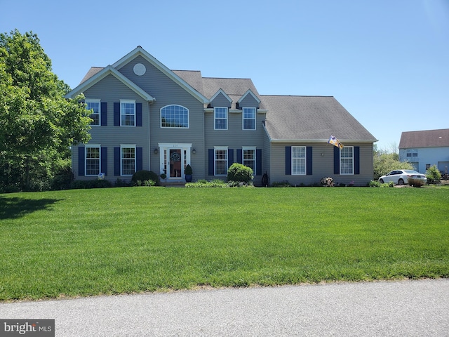 225 Canonero Dr, Bear, DE 19701 - colonial-style house featuring a front yard