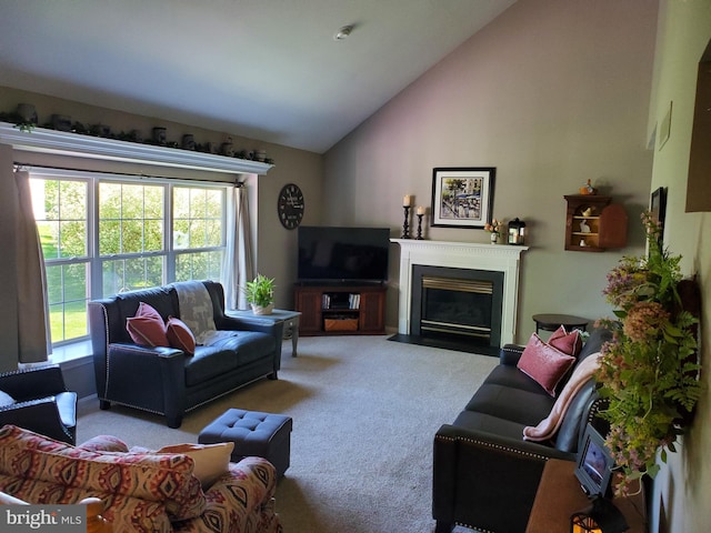 225 Canonero Dr, Bear, DE 19701 - carpeted living room featuring plenty of natural light, a fireplace with flush hearth, and high vaulted ceiling