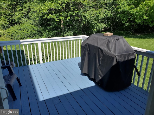 225 Canonero Dr, Bear, DE 19701 - wooden deck with a grill and a lawn