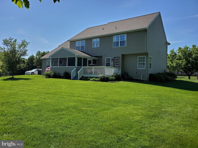 225 Canonero Dr, Bear, DE 19701 - back of house with a sunroom, a yard, and a deck