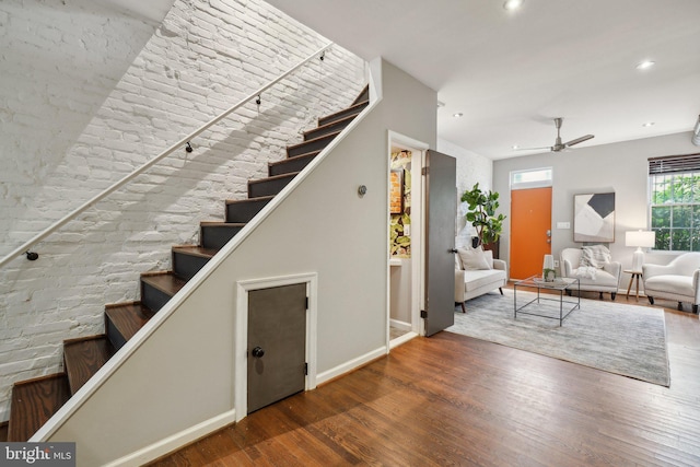223 Parker St NE, Washington, DC 20002 - stairs featuring wood finished floors, a ceiling fan, baseboards, and recessed lighting