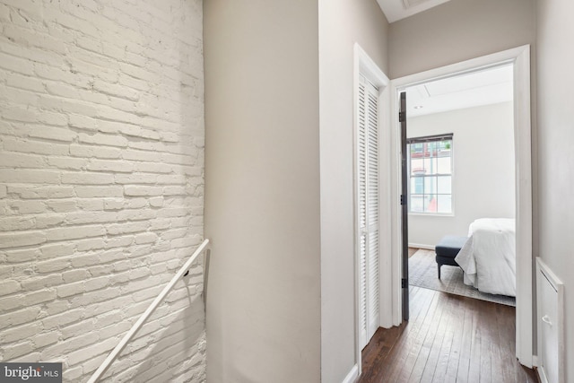 223 Parker St NE, Washington, DC 20002 - hallway with attic access, dark wood finished floors, and baseboards