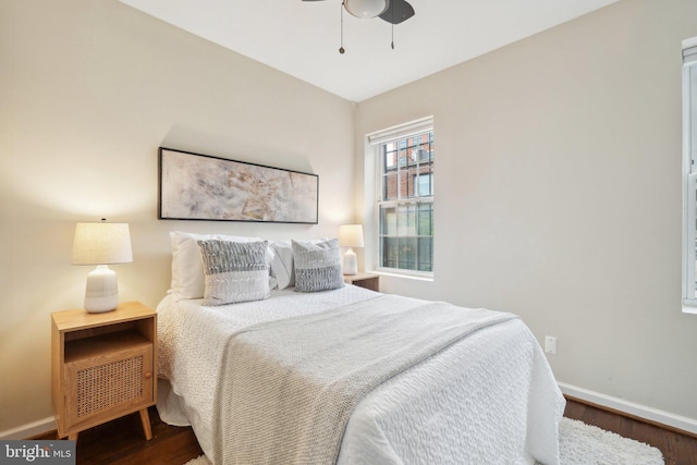 223 Parker St NE, Washington, DC 20002 - bedroom featuring baseboards, wood finished floors, and ceiling fan