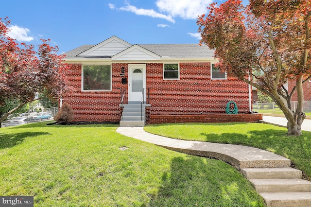 2129 Saranac St, Hyattsville, MD 20783 - view of front of property featuring entry steps, a front yard, and brick siding