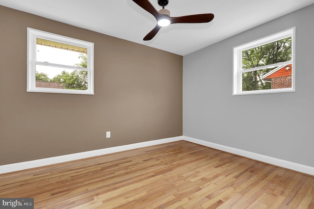 2129 Saranac St, Hyattsville, MD 20783 - empty room with plenty of natural light, ceiling fan, and baseboards