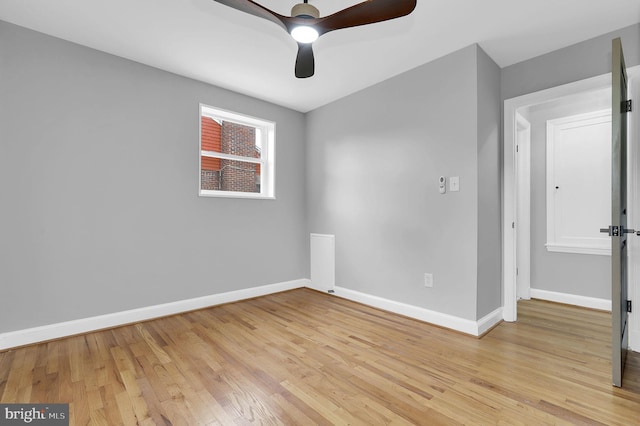 2129 Saranac St, Hyattsville, MD 20783 - empty room featuring baseboards, light wood finished floors, and a ceiling fan