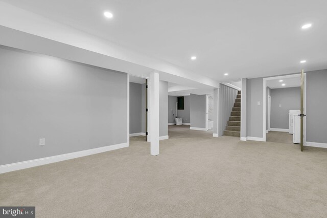 2129 Saranac St, Hyattsville, MD 20783 - finished basement featuring stairs, recessed lighting, light carpet, and baseboards