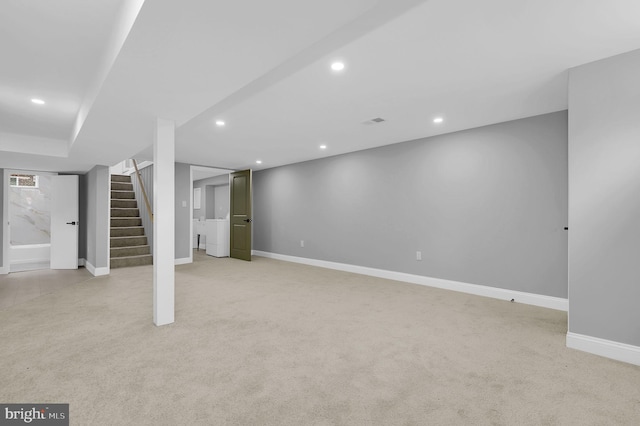 2129 Saranac St, Hyattsville, MD 20783 - finished below grade area with light carpet, recessed lighting, stairway, and baseboards