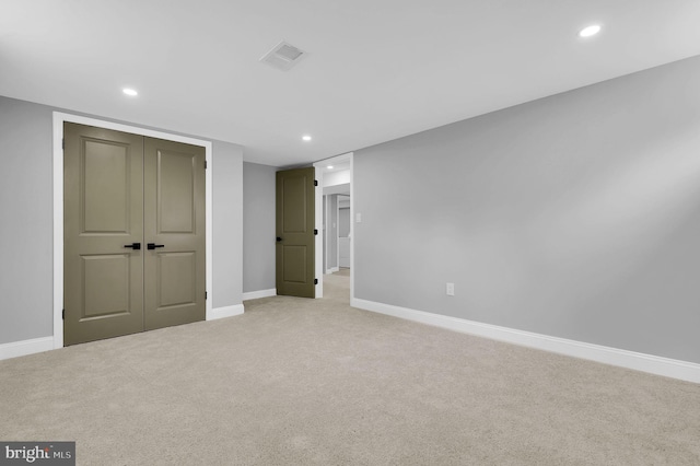 2129 Saranac St, Hyattsville, MD 20783 - unfurnished bedroom with recessed lighting, light carpet, baseboards, and a closet