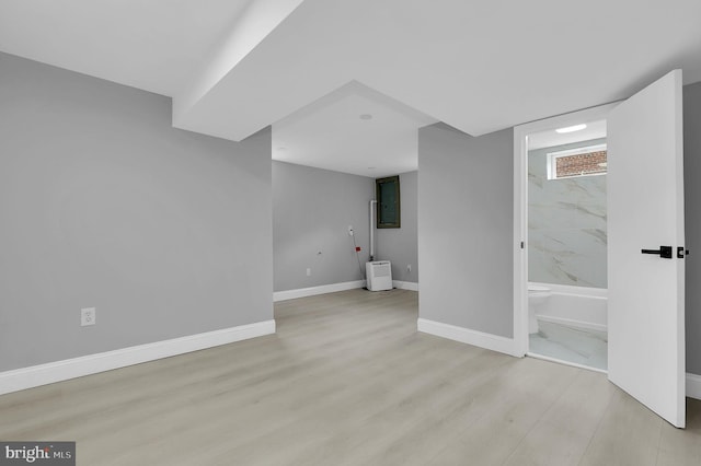 2129 Saranac St, Hyattsville, MD 20783 - below grade area with wood finished floors, baseboards, and electric panel