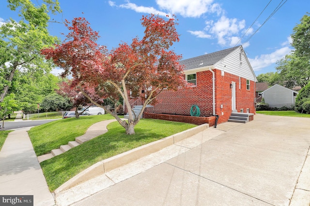 2129 Saranac St, Hyattsville, MD 20783 - view of front facade with brick siding and a front lawn