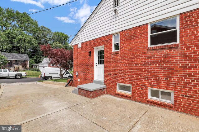 2129 Saranac St, Hyattsville, MD 20783 - view of exterior entry featuring brick siding