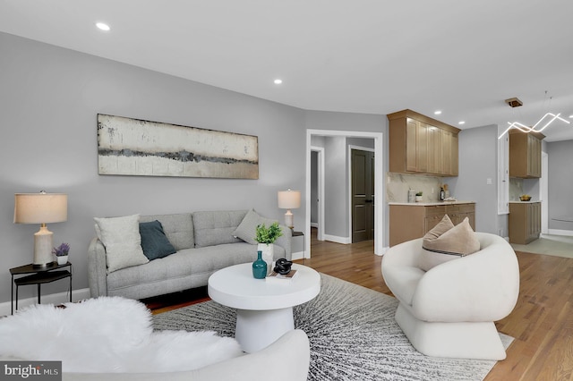 2129 Saranac St, Hyattsville, MD 20783 - living area with light wood-style floors, baseboards, and recessed lighting