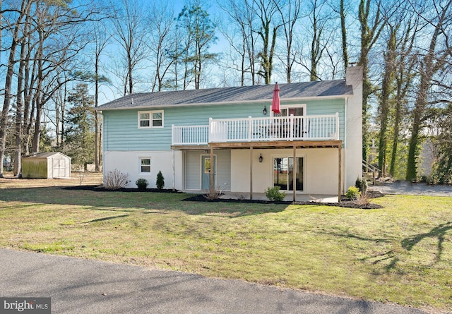 35775 Clam Ave, Frankford, DE 19945 - view of front of property featuring a chimney, a front yard, and a wooden deck