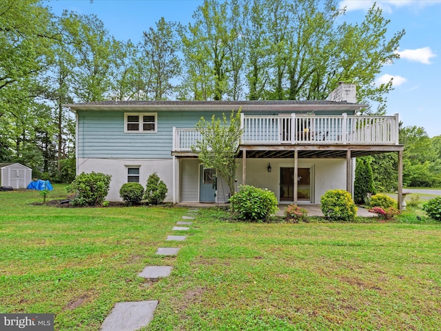 35775 Clam Ave, Frankford, DE 19945 - view of front of property with a front lawn, a wooden deck, and a chimney
