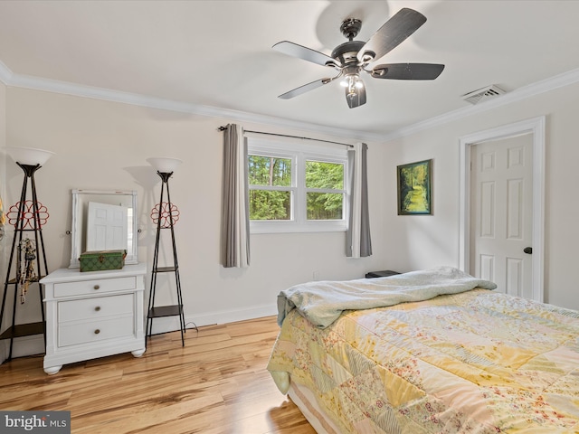 35775 Clam Ave, Frankford, DE 19945 - bedroom featuring ornamental molding, light wood-type flooring, baseboards, and a ceiling fan