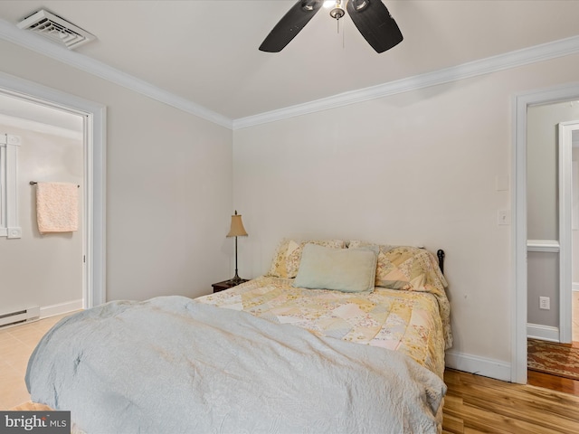 35775 Clam Ave, Frankford, DE 19945 - bedroom featuring crown molding, baseboards, ceiling fan, and wood finished floors