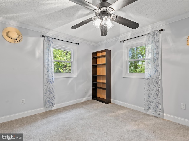 35775 Clam Ave, Frankford, DE 19945 - empty room featuring crown molding, carpet floors, a textured ceiling, ceiling fan, and baseboards