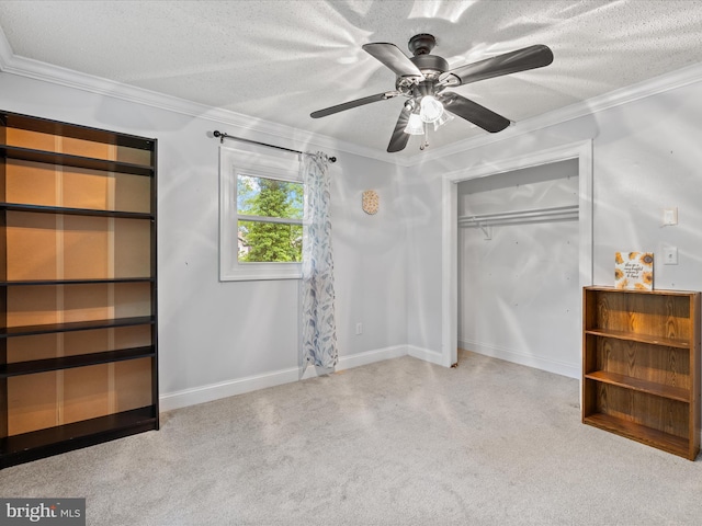 35775 Clam Ave, Frankford, DE 19945 - unfurnished bedroom featuring crown molding, a closet, a textured ceiling, ceiling fan, and baseboards