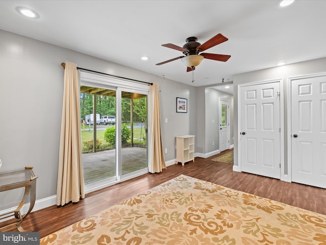 35775 Clam Ave, Frankford, DE 19945 - unfurnished bedroom featuring access to exterior, recessed lighting, wood finished floors, baseboards, and two closets
