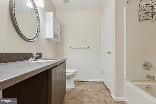 131 Red Haven Dr, North Wales, PA 19454 - bathroom featuring baseboards, vanity, toilet, stone finish flooring, and shower / tub combination