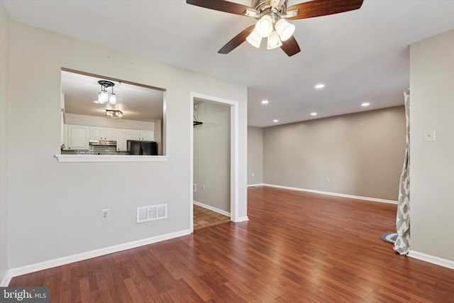 131 Red Haven Dr, North Wales, PA 19454 - unfurnished living room with wood finished floors, recessed lighting, ceiling fan, and baseboards