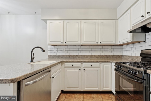 131 Red Haven Dr, North Wales, PA 19454 - kitchen featuring stainless steel dishwasher, black range with gas cooktop, a sink, under cabinet range hood, and a peninsula