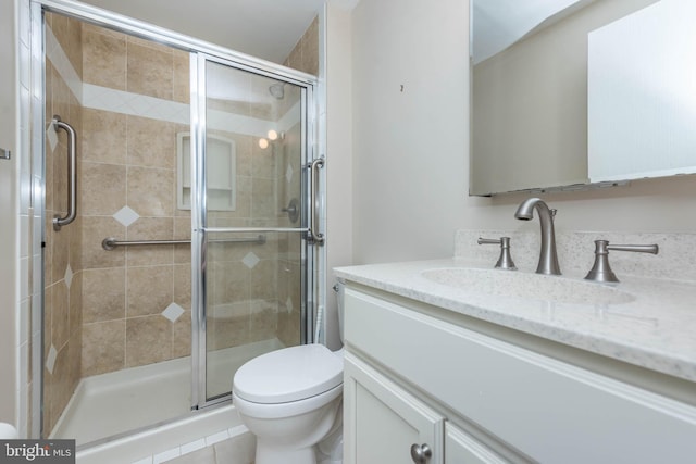 7037 Macbeth Way, Sykesville, MD 21784 - bathroom featuring a shower stall, toilet, vanity, and tile patterned flooring