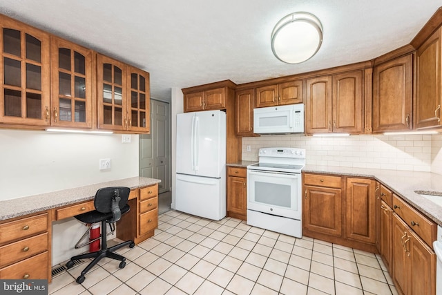 7037 Macbeth Way, Sykesville, MD 21784 - kitchen featuring white appliances, brown cabinetry, glass insert cabinets, and decorative backsplash