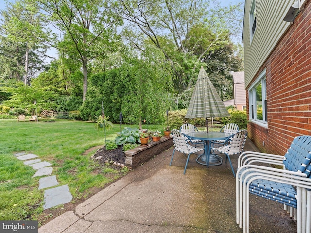 129 Kingston Rd, Cheltenham, PA 19012 - view of patio with outdoor dining area and view of scattered trees