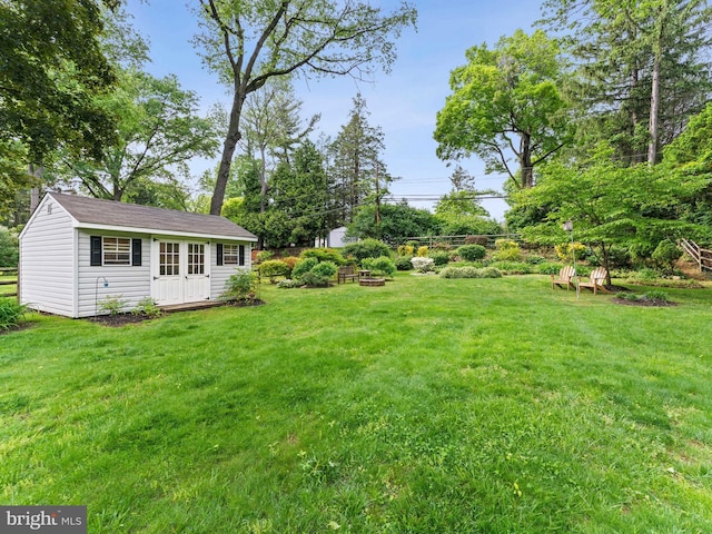 129 Kingston Rd, Cheltenham, PA 19012 - view of green lawn featuring an outdoor structure