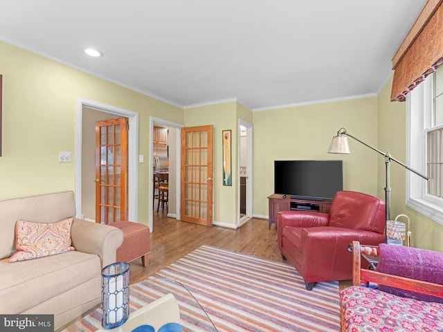 129 Kingston Rd, Cheltenham, PA 19012 - living room with wood finished floors, crown molding, baseboards, and recessed lighting