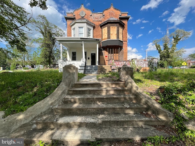 view of front of property with brick siding