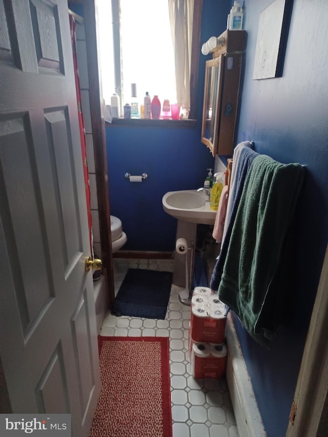 8231 Craig St, Philadelphia, PA 19136 - bathroom with toilet and tile patterned floors