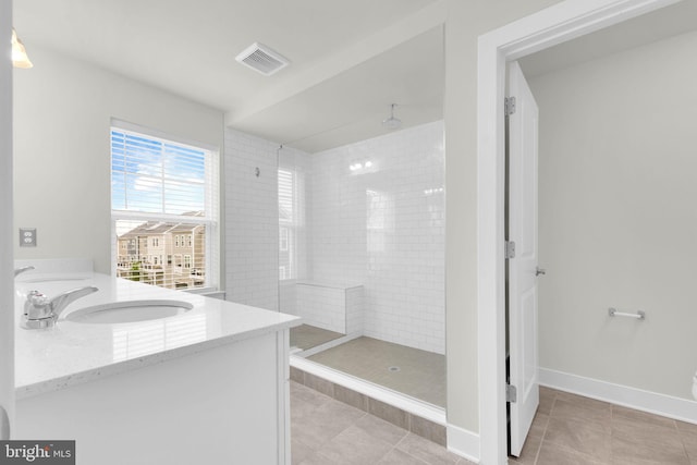 1552 Meadowlark Glen Rd, Dumfries, VA 22026 - full bath featuring tile patterned flooring, a shower stall, double vanity, and baseboards
