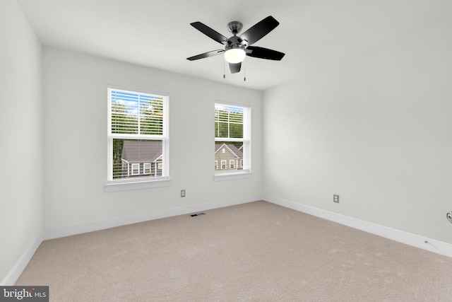 1552 Meadowlark Glen Rd, Dumfries, VA 22026 - spare room featuring light carpet, baseboards, and ceiling fan