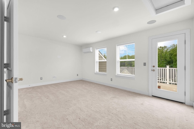1552 Meadowlark Glen Rd, Dumfries, VA 22026 - carpeted empty room with a wall mounted air conditioner, baseboards, recessed lighting, and attic access
