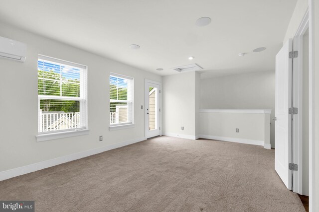 1552 Meadowlark Glen Rd, Dumfries, VA 22026 - carpeted spare room with a wall mounted air conditioner and baseboards