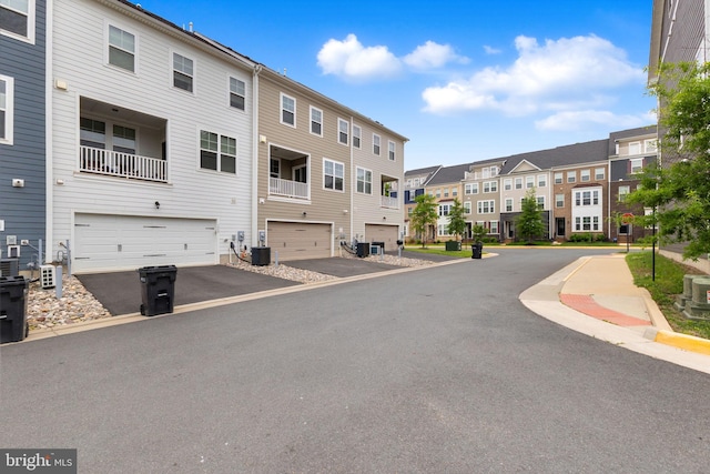 1552 Meadowlark Glen Rd, Dumfries, VA 22026 - view of asphalt road featuring a residential view and curbs