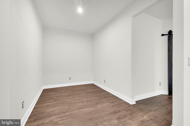 1552 Meadowlark Glen Rd, Dumfries, VA 22026 - unfurnished room featuring dark wood-type flooring and baseboards