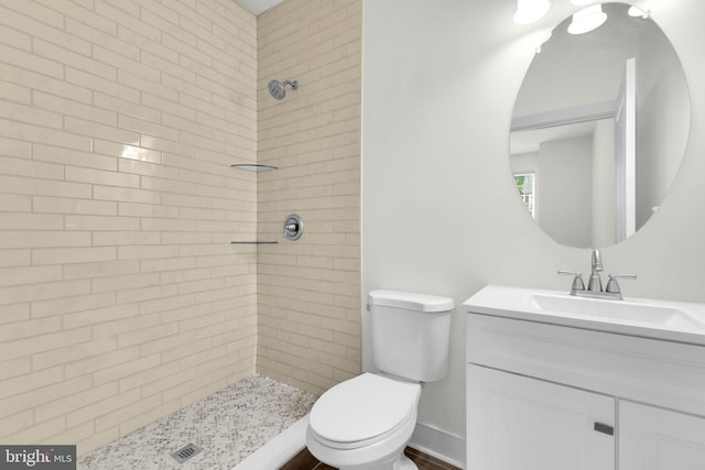 1552 Meadowlark Glen Rd, Dumfries, VA 22026 - bathroom with a tile shower, toilet, and vanity