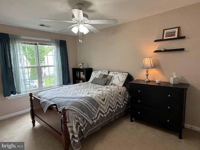 5280 Gunston Hall Dr, Woodbridge, VA 22193 - bedroom with light colored carpet, baseboards, and a ceiling fan