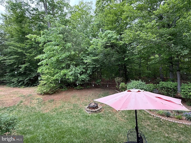 5280 Gunston Hall Dr, Woodbridge, VA 22193 - view of green lawn featuring an outdoor fire pit